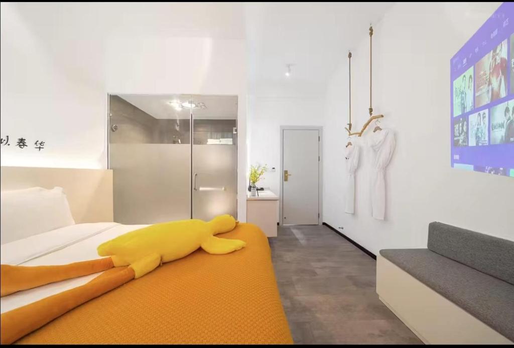 Postel nebo postele na pokoji v ubytování Xiamen Mingshu Shanqiu Homestay