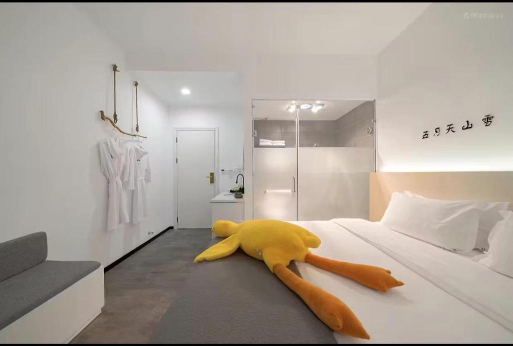 Postel nebo postele na pokoji v ubytování Xiamen Mingshu Shanqiu Homestay