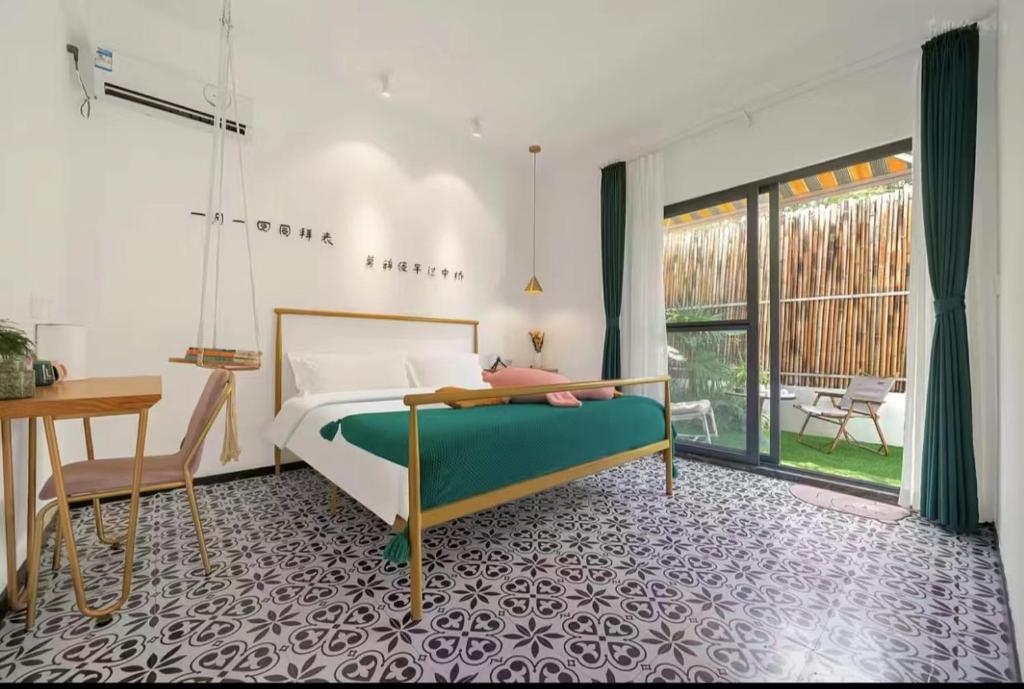Postel nebo postele na pokoji v ubytování Xiamen Mingshu Shanqiu Homestay