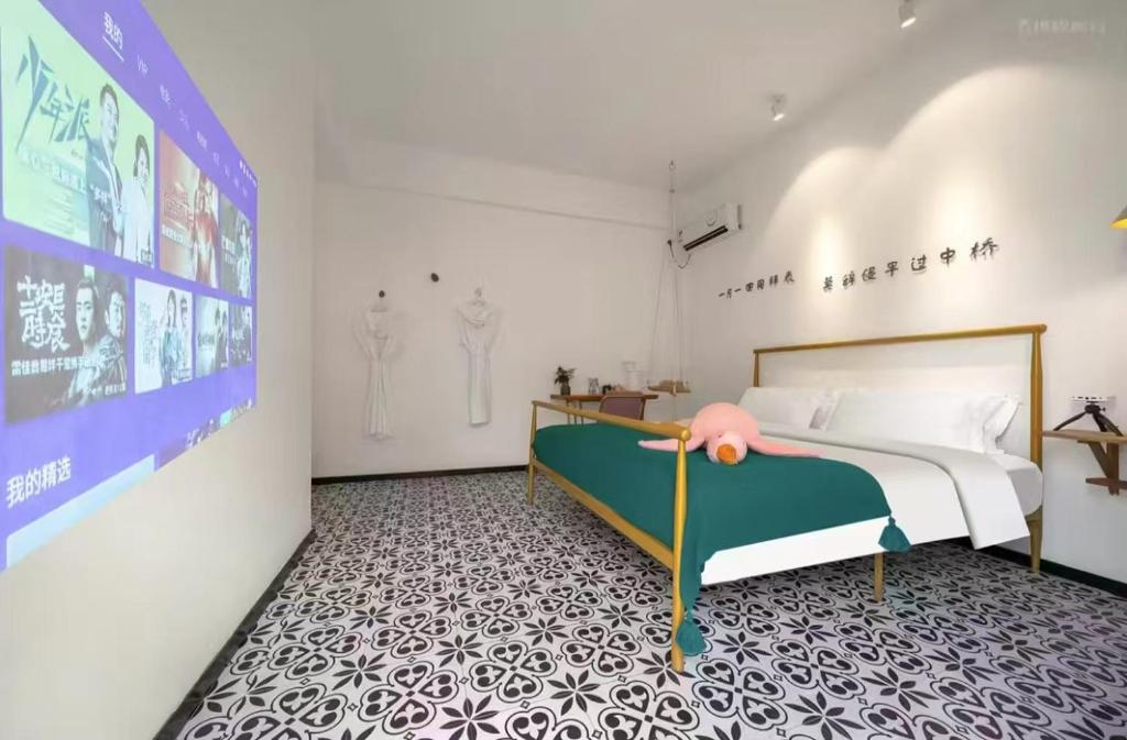 Postel nebo postele na pokoji v ubytování Xiamen Mingshu Shanqiu Homestay