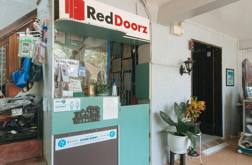 Certifikát, hodnocení, plakát nebo jiný dokument vystavený v ubytování RedDoorz at Bunakidz Lodge El Nido Palawan