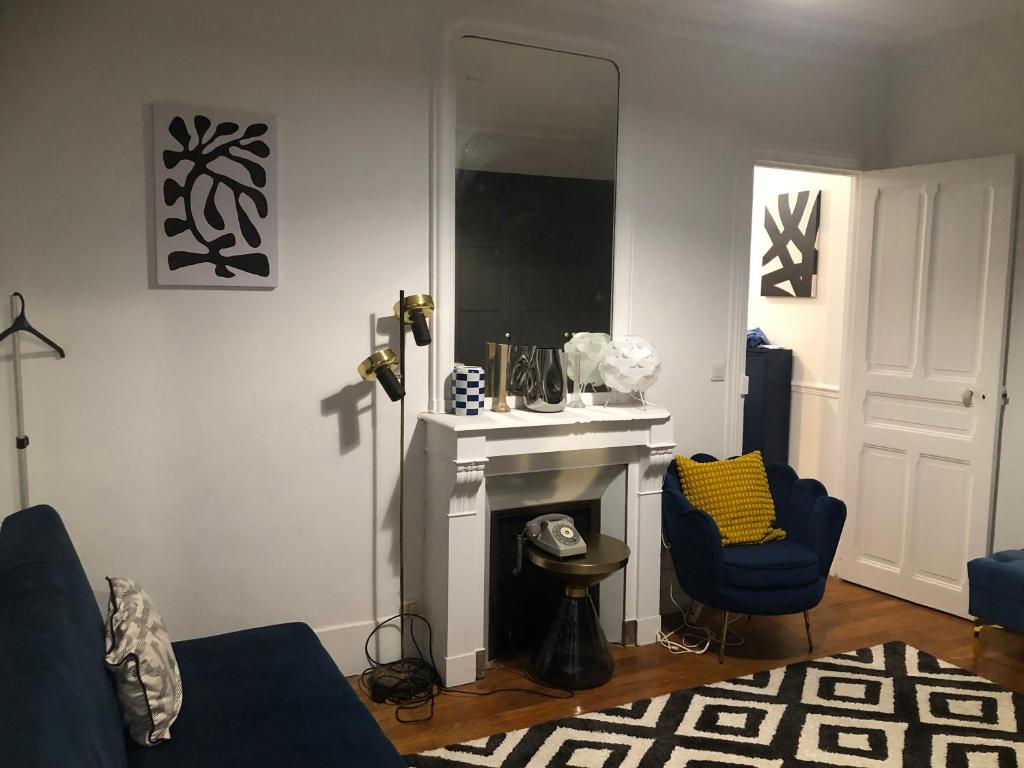 Χώρος καθιστικού στο Bel appartement cosy et baroque