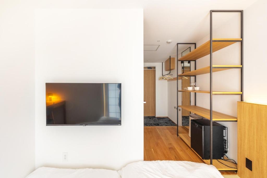 TV a/nebo společenská místnost v ubytování Dash Living Gojo