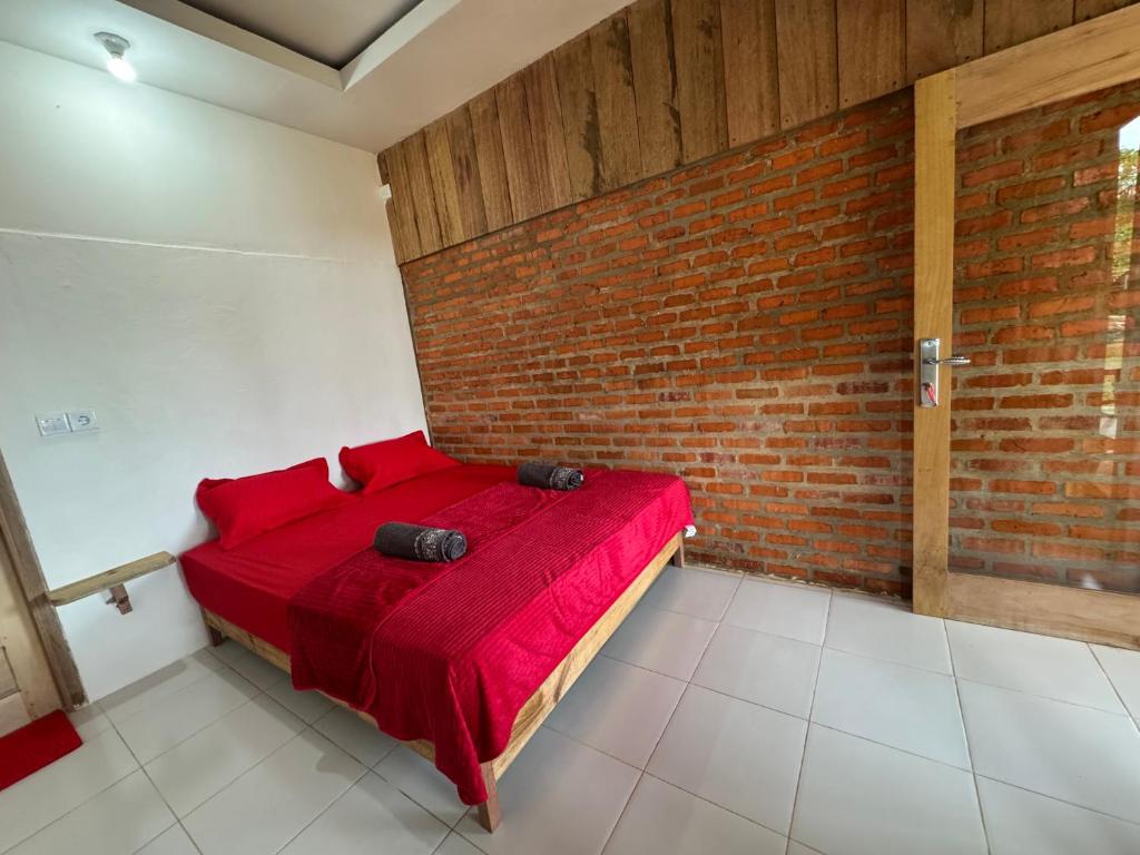 Postel nebo postele na pokoji v ubytování Simagirau Homestay