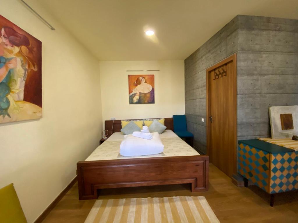 Postel nebo postele na pokoji v ubytování Gallery Guesthouse