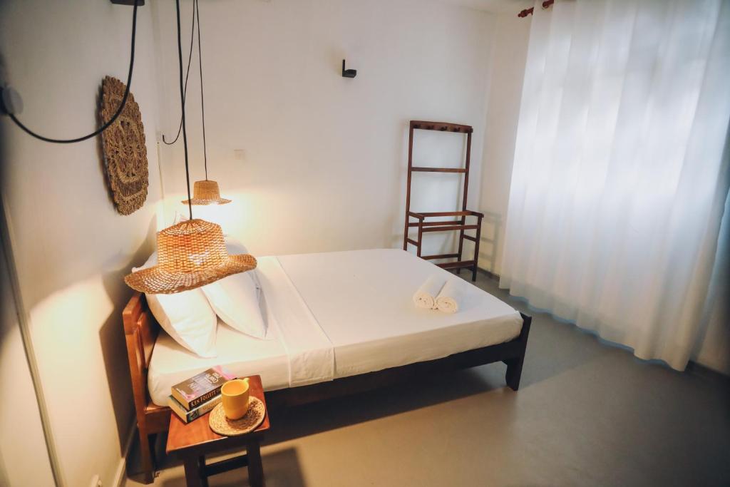 Postel nebo postele na pokoji v ubytování Island Diaries Hostel