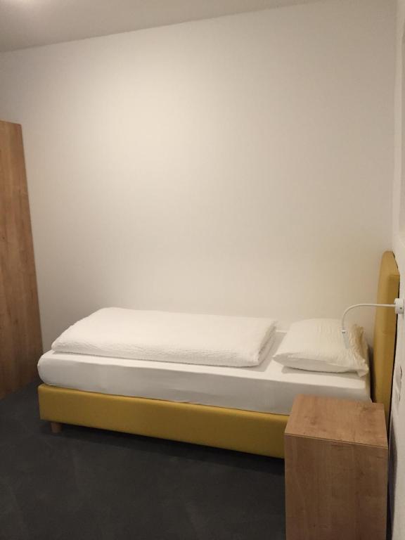 Postel nebo postele na pokoji v ubytování R&B La Calzoleria