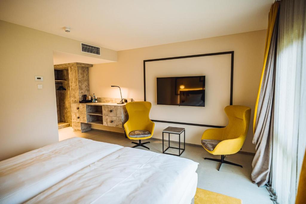 Postel nebo postele na pokoji v ubytování Hotel Ederstrand