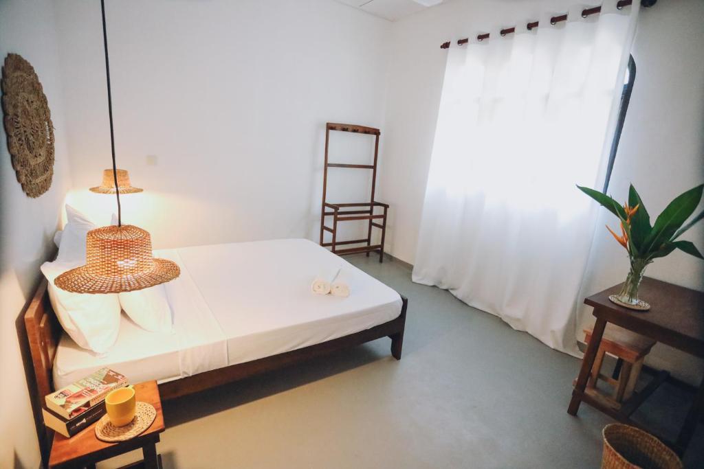 Postel nebo postele na pokoji v ubytování Island Diaries Hostel