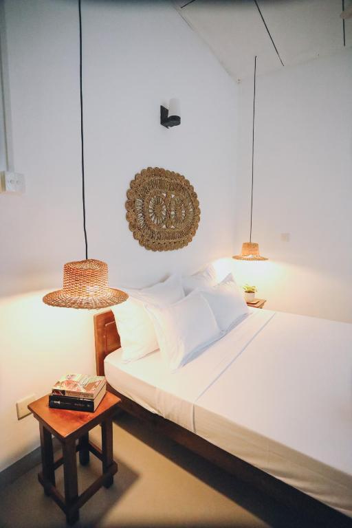 Postel nebo postele na pokoji v ubytování Island Diaries Hostel