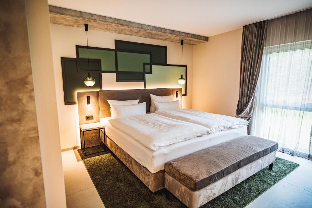 Postel nebo postele na pokoji v ubytování Hotel Ederstrand
