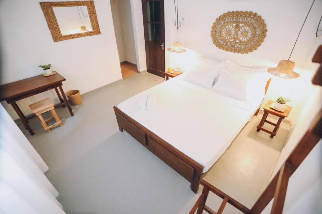 Postel nebo postele na pokoji v ubytování Island Diaries Hostel