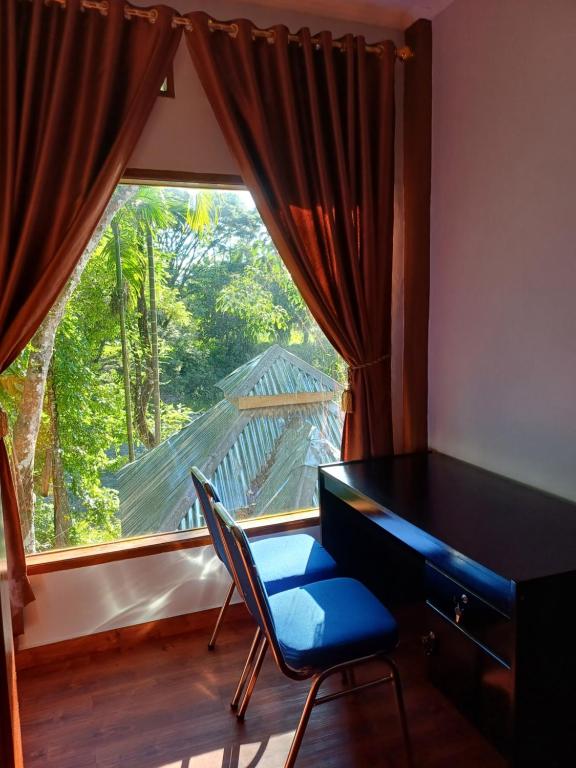 Balkón nebo terasa v ubytování Asim Paris Guesthouse & jungle trekking