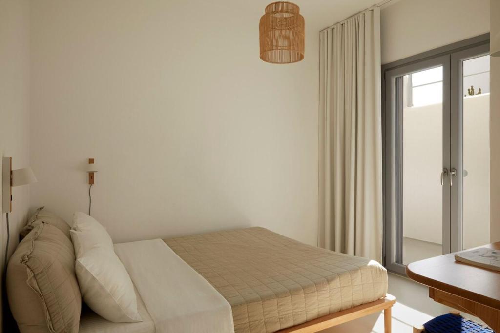 Postel nebo postele na pokoji v ubytování Isychos House - Tranquil Oasis