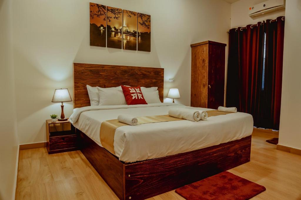 Postel nebo postele na pokoji v ubytování Lucky Transit Hotel - Katunayake Airport