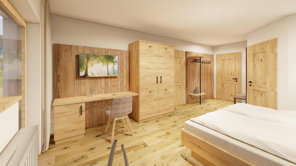 Postel nebo postele na pokoji v ubytování Hotel Langeck
