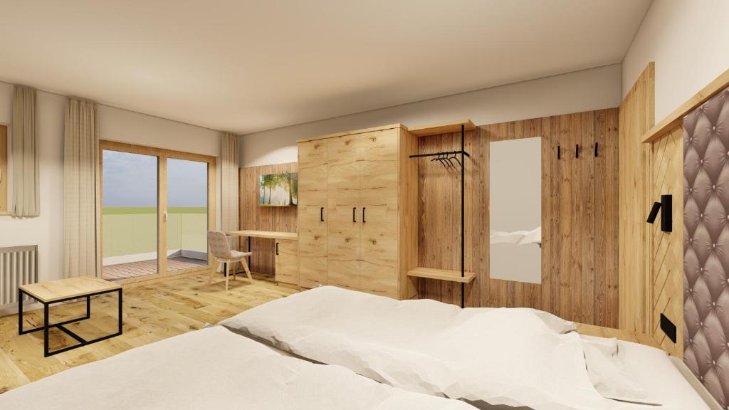 Postel nebo postele na pokoji v ubytování Hotel Langeck