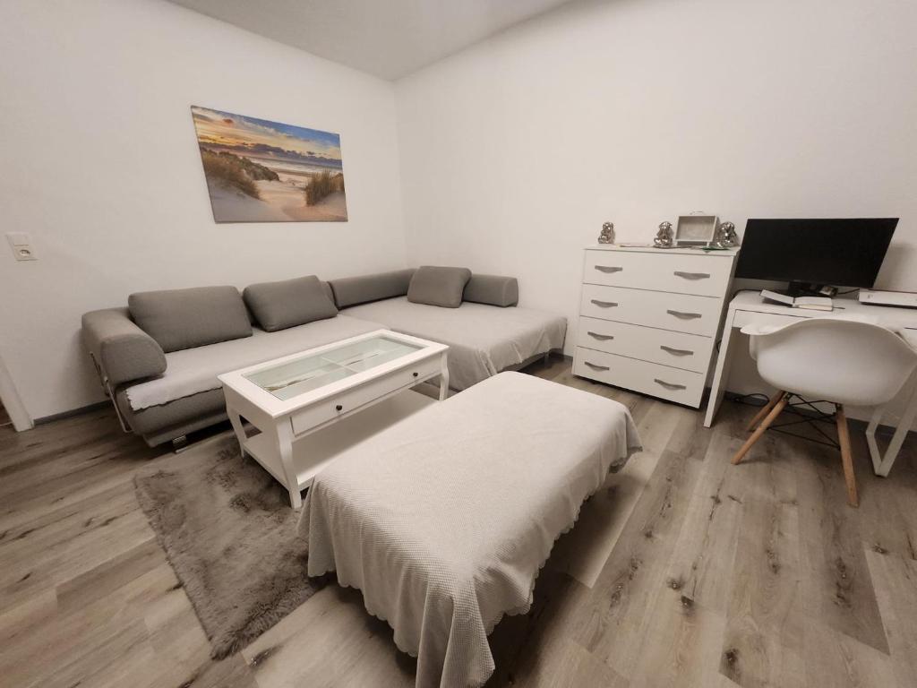 Postel nebo postele na pokoji v ubytování TOR STAY - Charmante 2 Zimmer Apartment