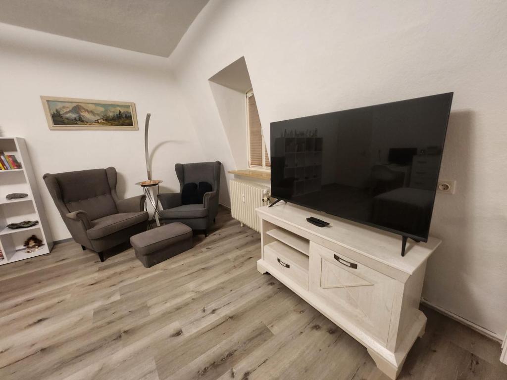 TV a/nebo společenská místnost v ubytování TOR STAY - Charmante 2 Zimmer Apartment