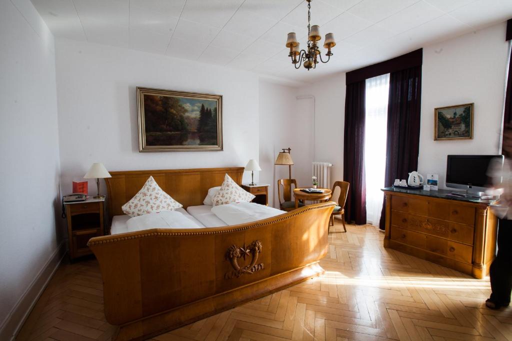 Postel nebo postele na pokoji v ubytování Carlton-Europe Vintage Adults Hotel