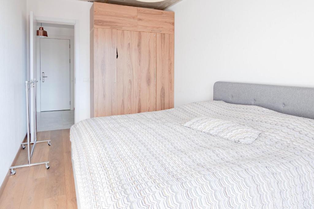Postel nebo postele na pokoji v ubytování 2-room apartment New Gudauri Loft 1