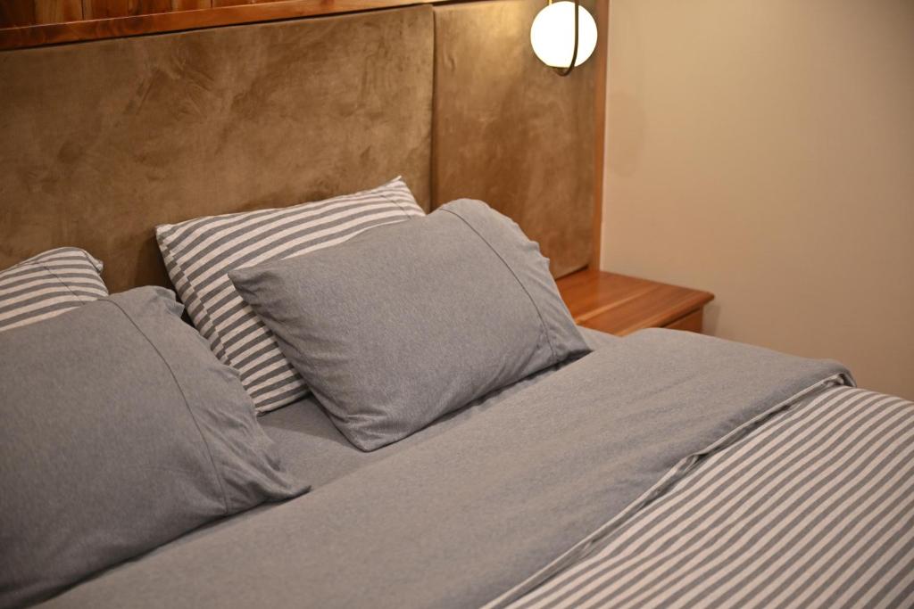 Postel nebo postele na pokoji v ubytování The Moonlight Guesthouse