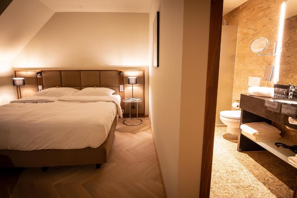 Postel nebo postele na pokoji v ubytování EST Residence Schönbrunn Vienna - Apartments