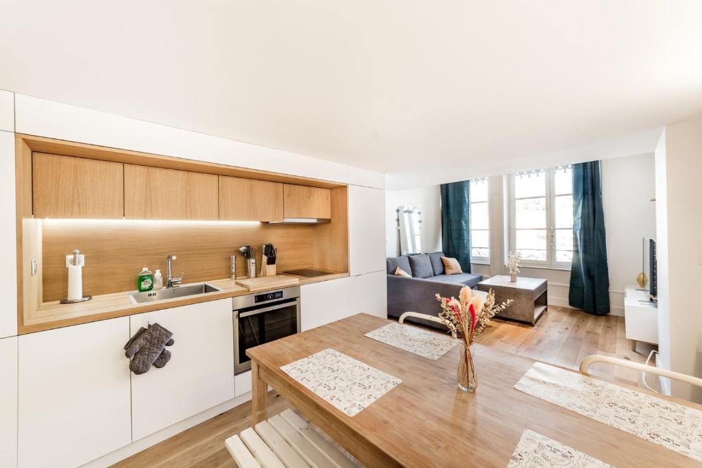 Kuchyňa alebo kuchynka v ubytovaní Loft mezzanine vue incroyable Saône