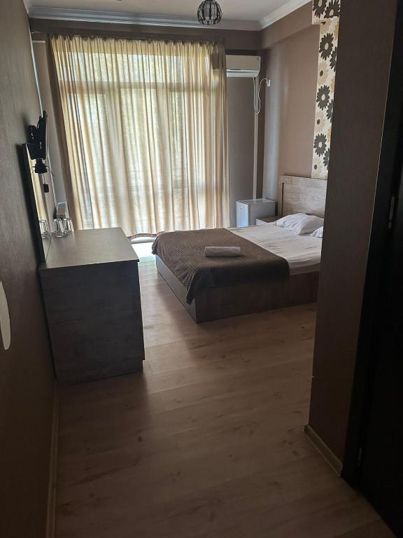 Postel nebo postele na pokoji v ubytování Hotel Nirvana