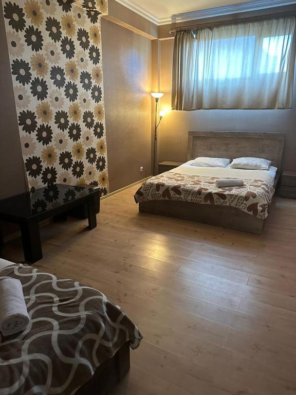 Postel nebo postele na pokoji v ubytování Hotel Nirvana