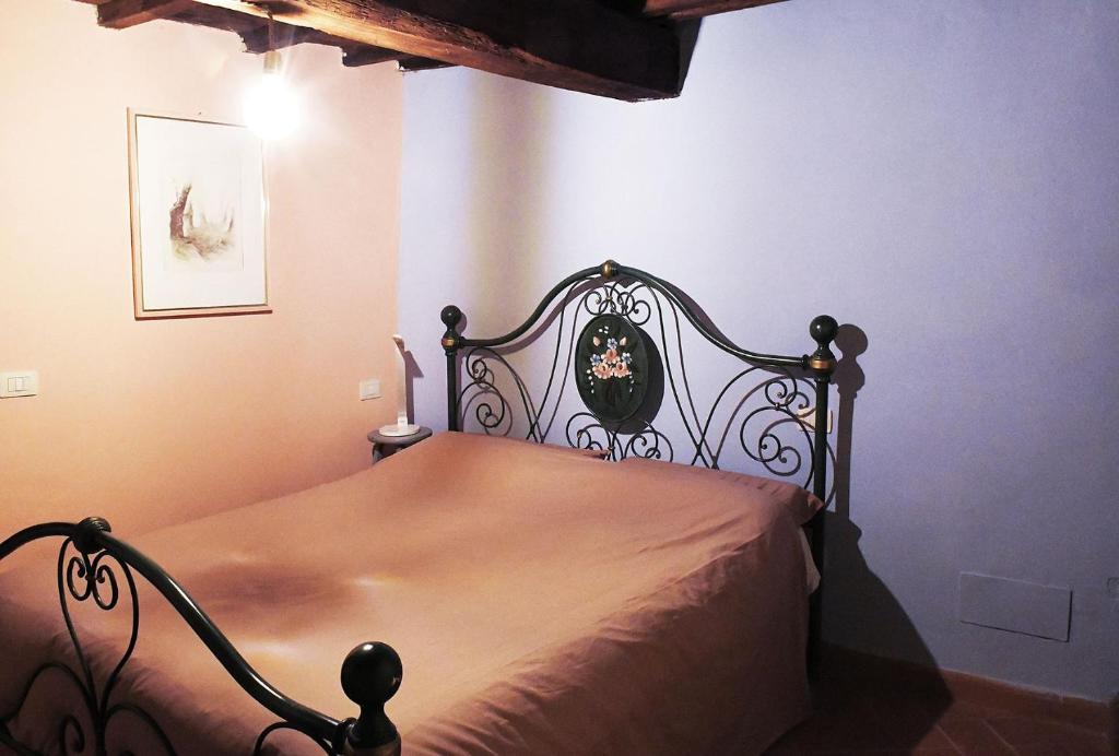 Postel nebo postele na pokoji v ubytování La Palette