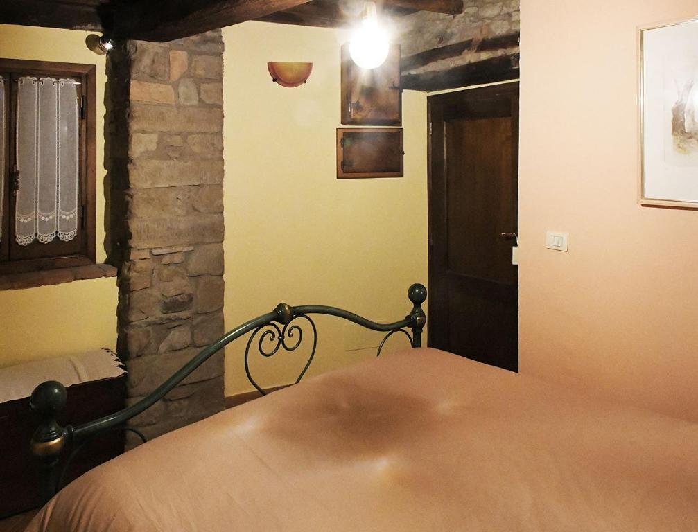 Postel nebo postele na pokoji v ubytování La Palette