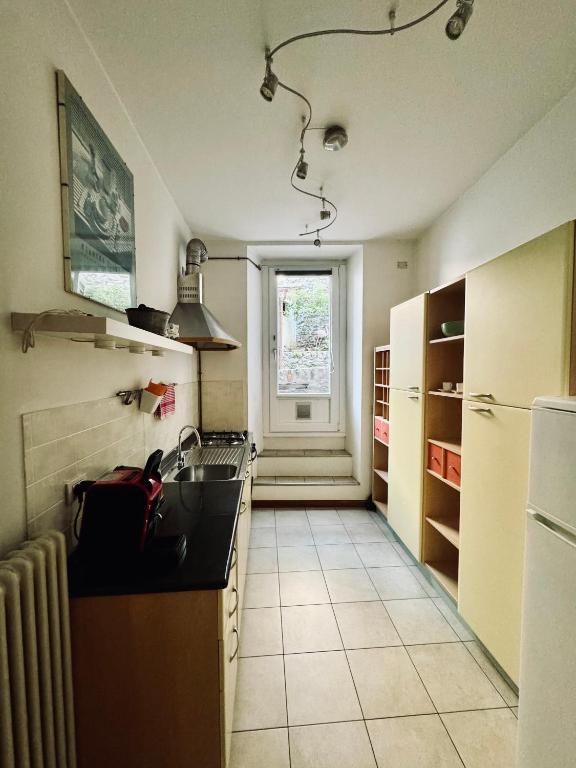 Kuchyň nebo kuchyňský kout v ubytování Casa Parravicini