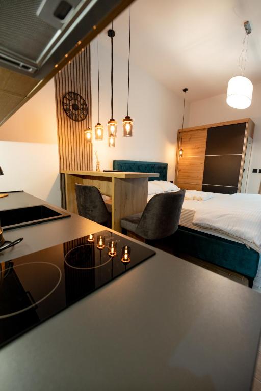 Postel nebo postele na pokoji v ubytování Top Zlatar Apartmani