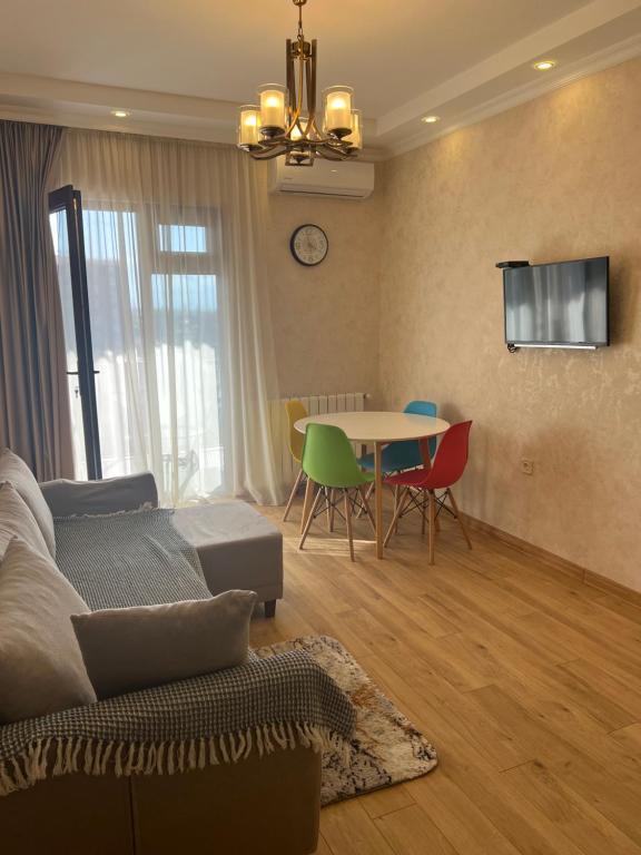 TV a/nebo společenská místnost v ubytování InTown
