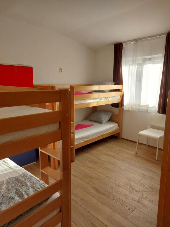Postel nebo postele na pokoji v ubytování Hostel Inn Downtown