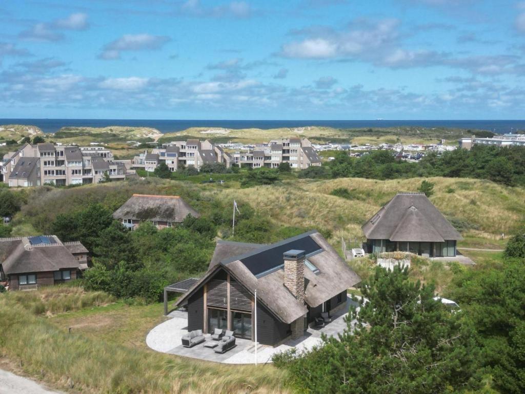 an aerial view of a house on a hill at Sig Ward (12p) in Nes