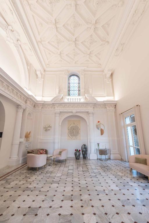 Posezení v ubytování Hôtel l'Orangeraie