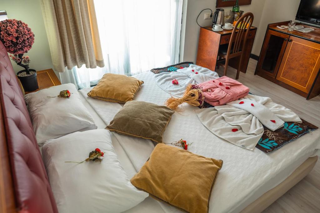 Postel nebo postele na pokoji v ubytování Scylax Hotels Mahmutlar