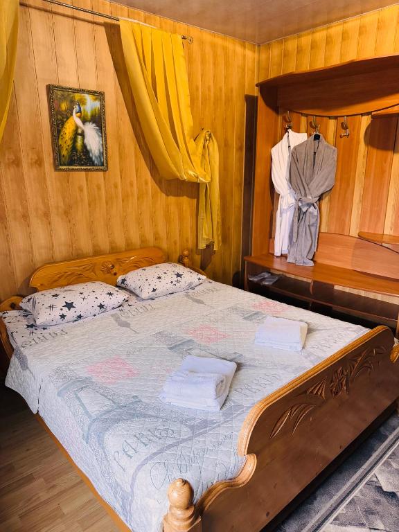 Postel nebo postele na pokoji v ubytování Pid Yavorom