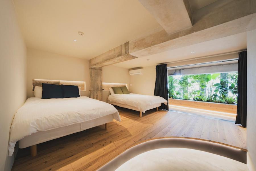 Postel nebo postele na pokoji v ubytování nine stories hotel