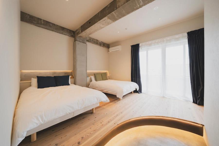 Postel nebo postele na pokoji v ubytování nine stories hotel