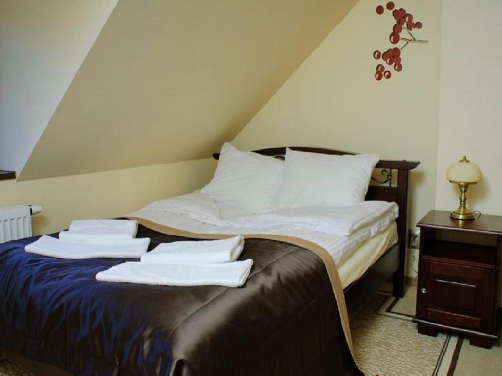 Postel nebo postele na pokoji v ubytování Czocha Palace&Czocha Camping - OR Czocha