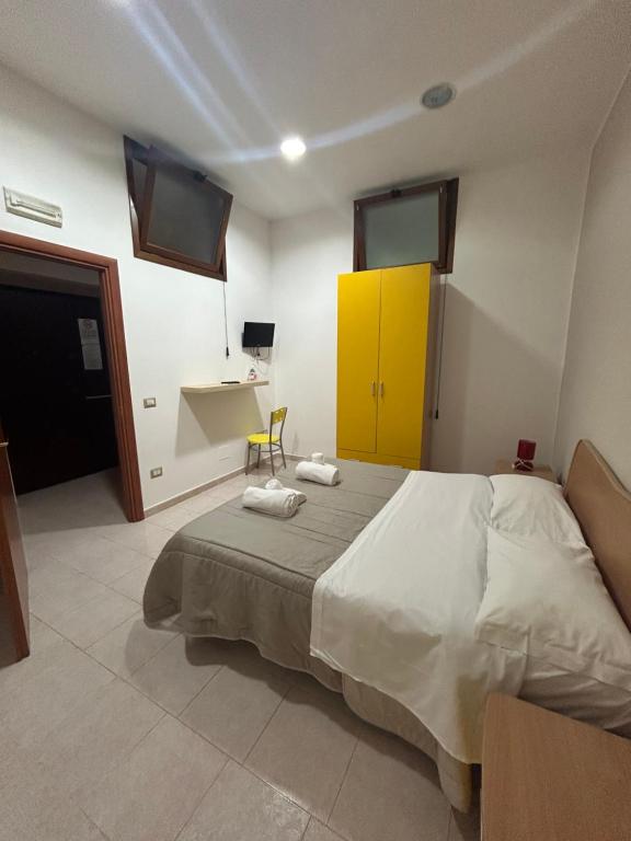 Postel nebo postele na pokoji v ubytování G&A Conte B&B