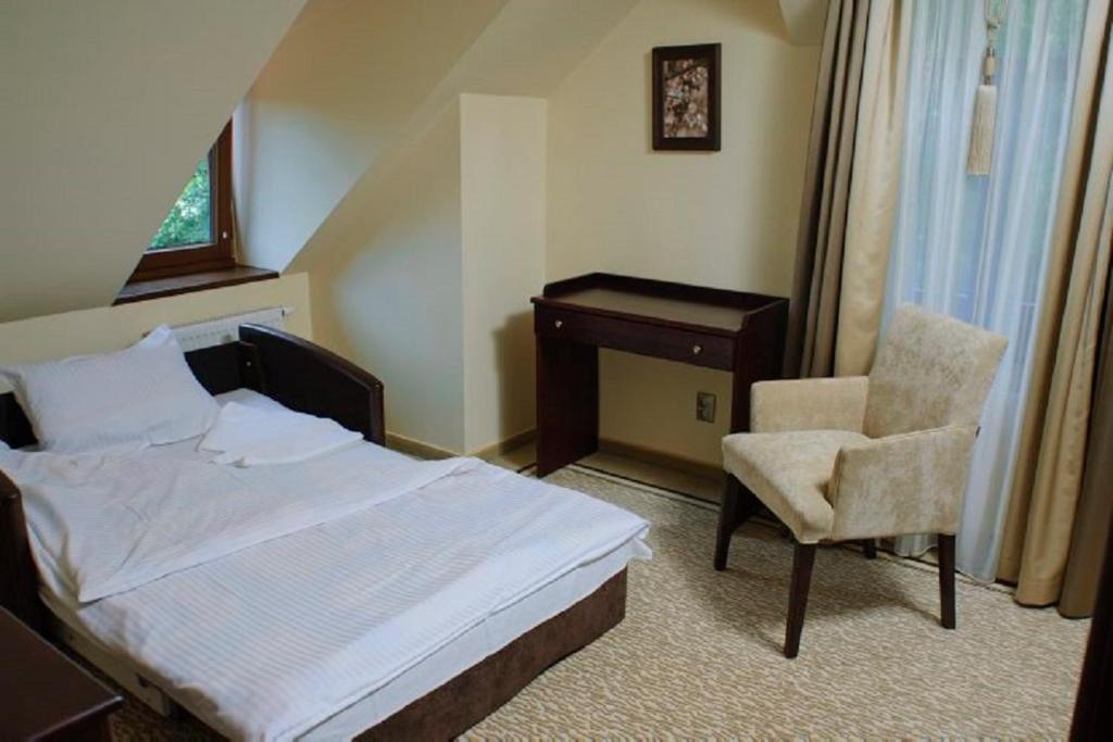 Postel nebo postele na pokoji v ubytování Czocha Palace&Czocha Camping - OR Czocha