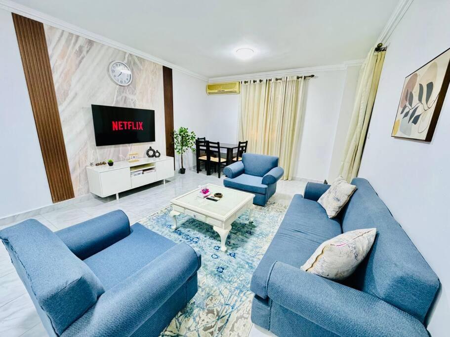 TV a/nebo společenská místnost v ubytování Relaxing Apartment with garden view in New Cairo