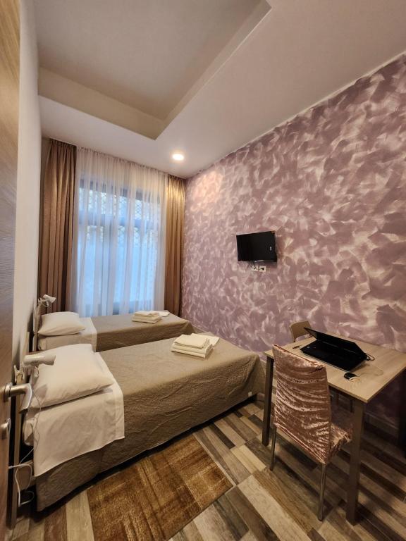 Postel nebo postele na pokoji v ubytování Casa Roxana