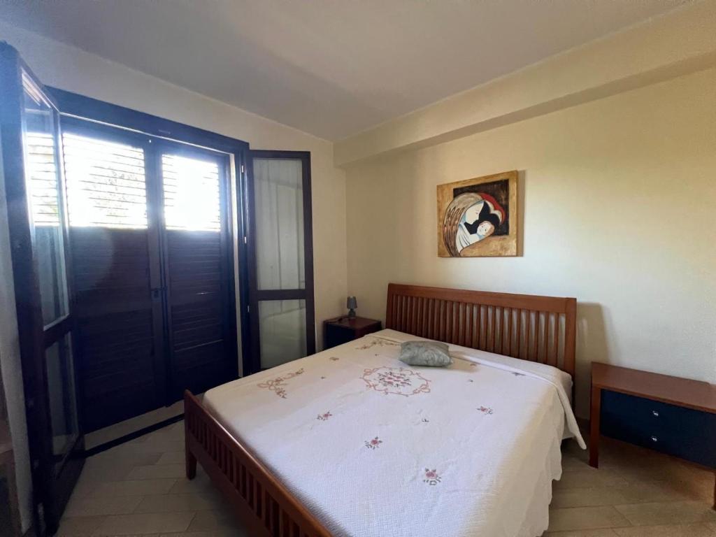 Ένα ή περισσότερα κρεβάτια σε δωμάτιο στο Villa Maria