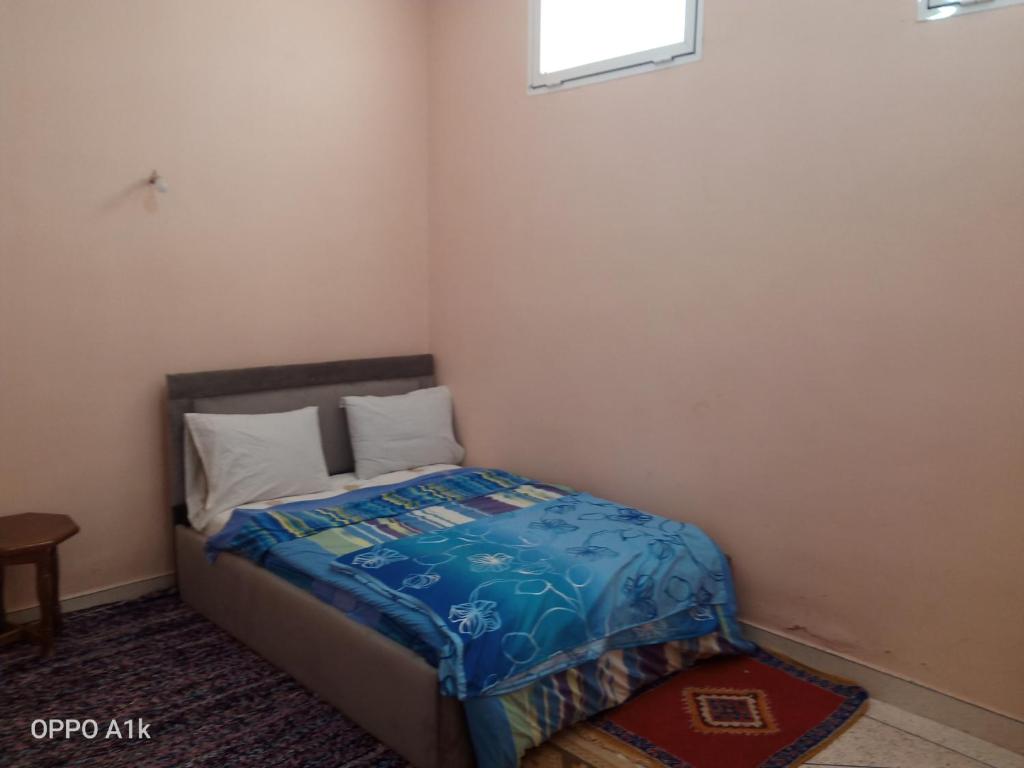 Postel nebo postele na pokoji v ubytování chez l'habitant amazigh