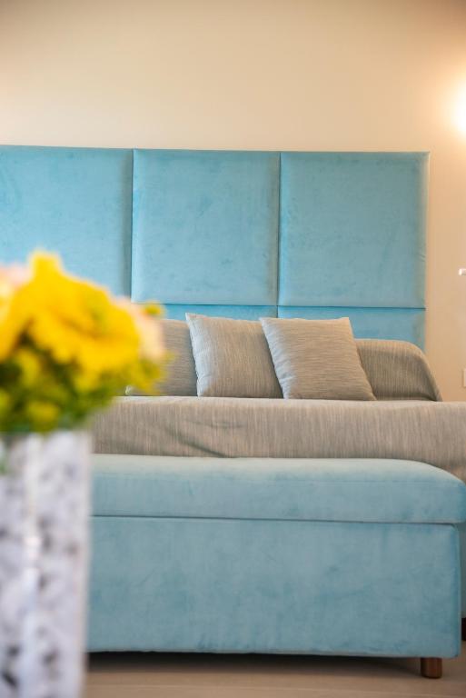 Postel nebo postele na pokoji v ubytování Hotel Fabricia